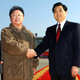 North Korean leader Kim Jong-il (L) shakes hands with Chinese President Hu Jintao as he sees off the Chinese leader on his departure from Pyongyang airport October 30, 2005, in this picture released by Korea News Service in Tokyo October 31, 2005. Hu was concluding an official visit to North Korea. JAPAN OUT REUTERS/Korea News Service - RP2DSFIICSAD